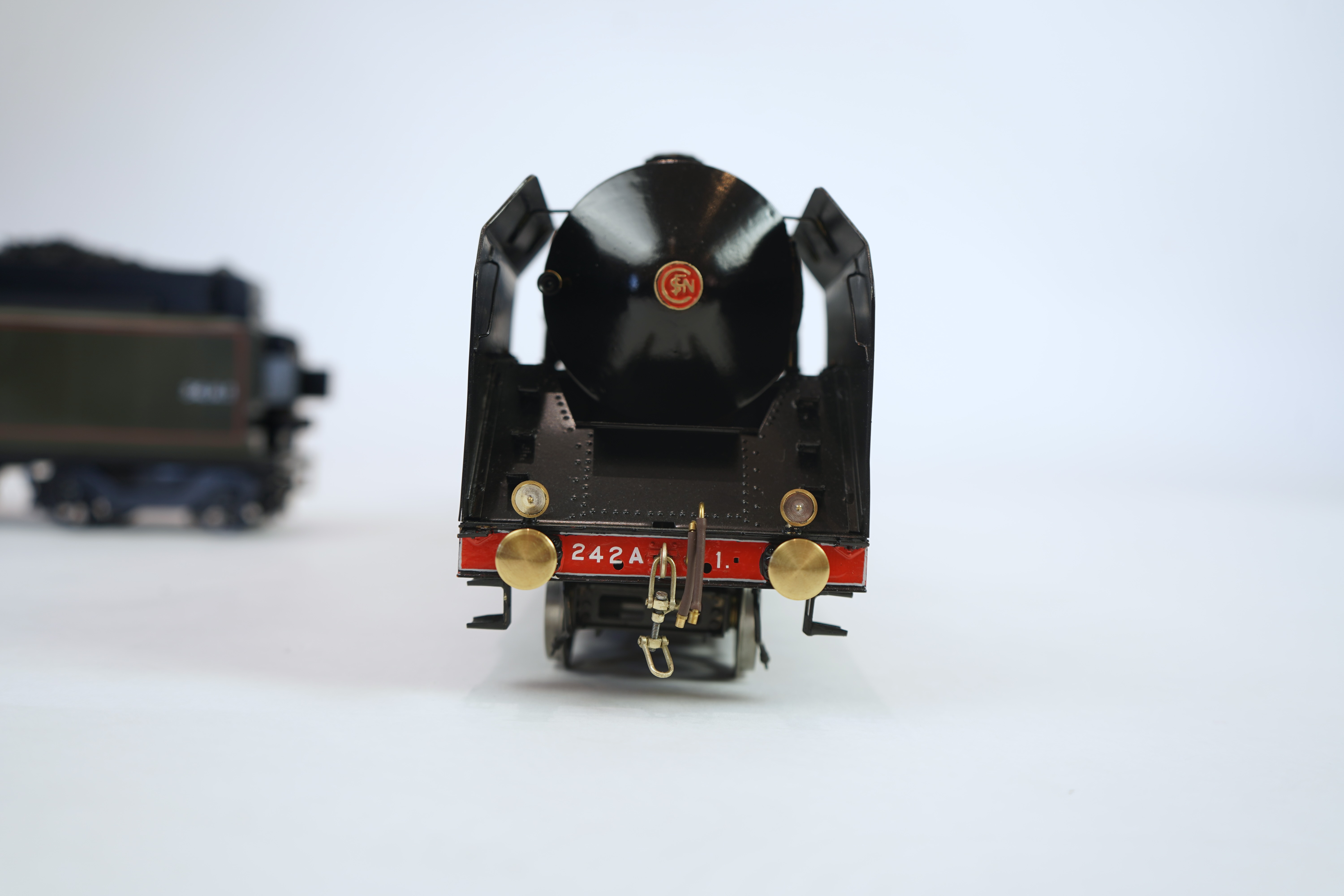 A Gauge One exhibition quality scratch built model of Andre Chapelon’s iconic SNCF 242.A.1, 2-4-2 tender locomotive, built by the Finescale Locomotive Company (under Neil Rose) from a commission.
